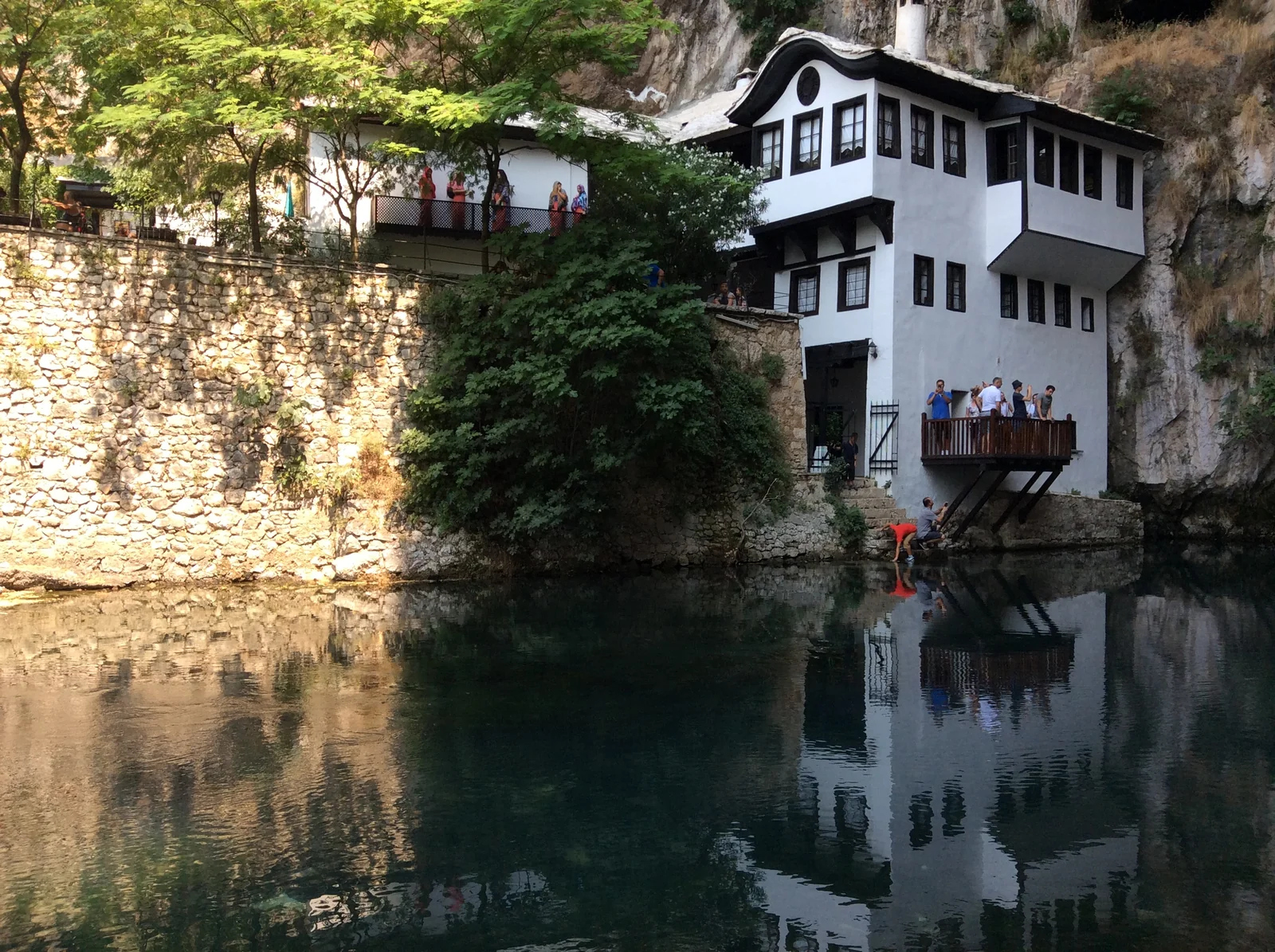 Buna karst spring emerging beneath the cliff at Blagaj