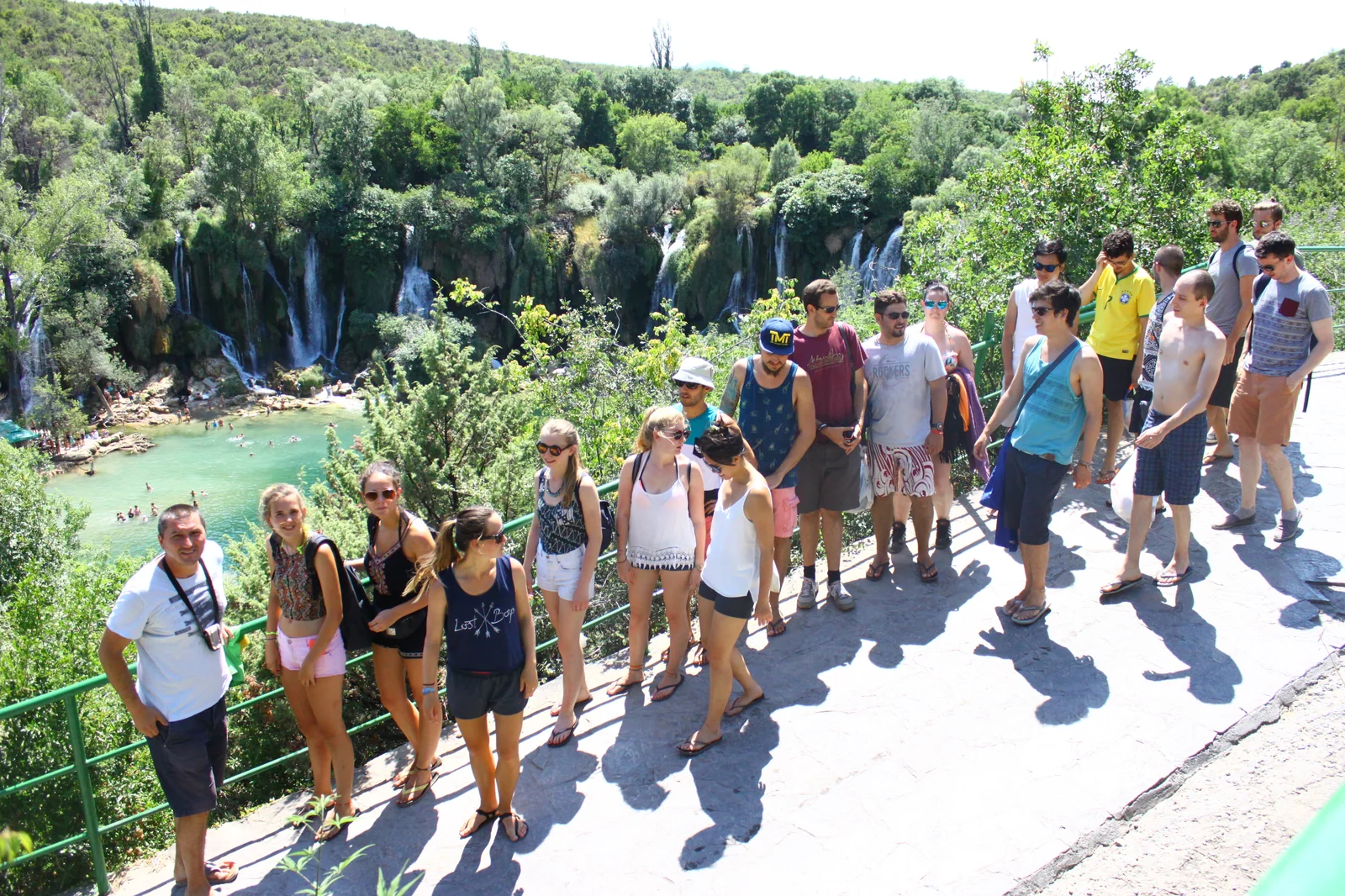Tour group arriving at the Kravica Waterfall viewing platform