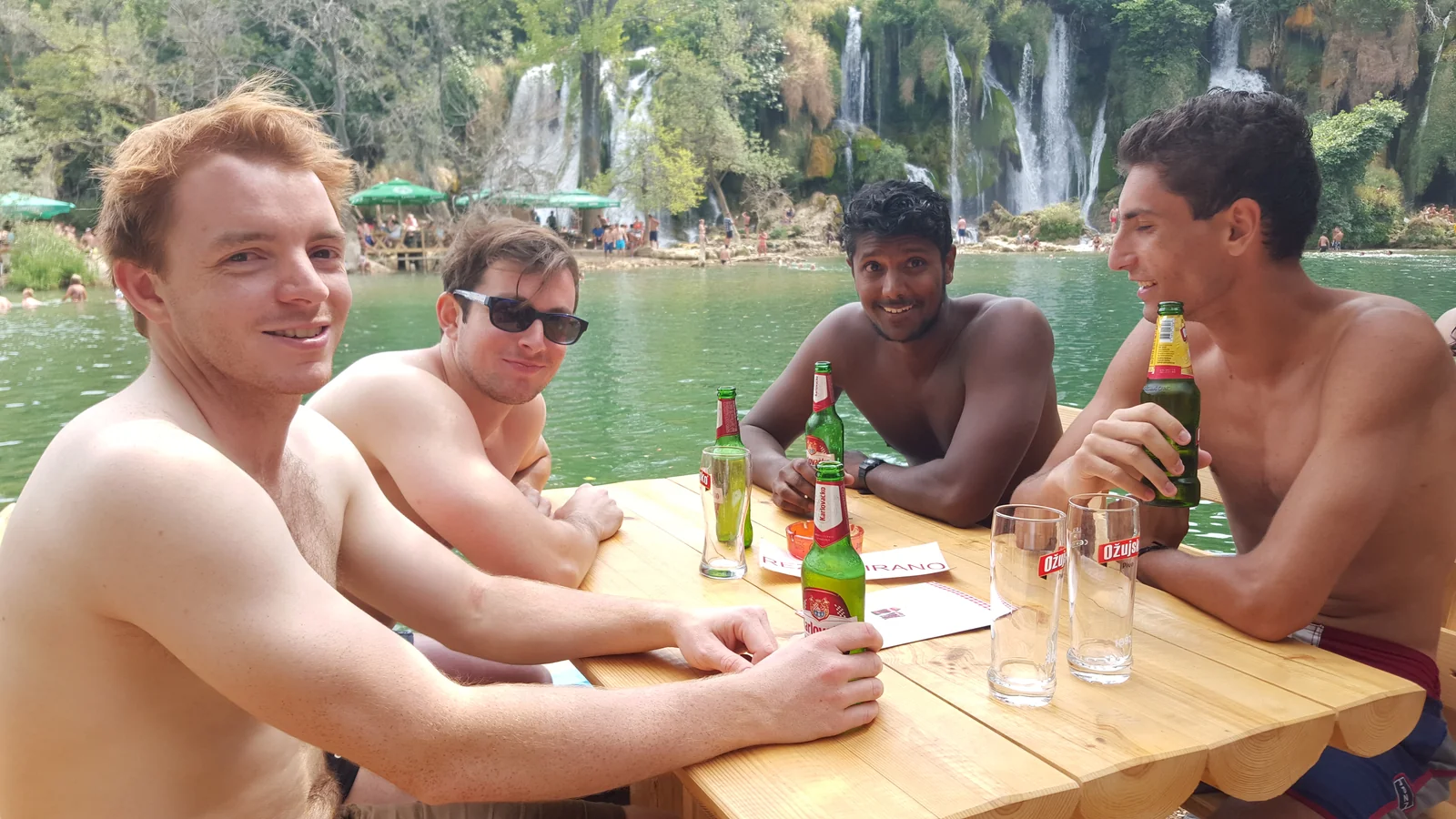 Guests swimming at Kravica Waterfall